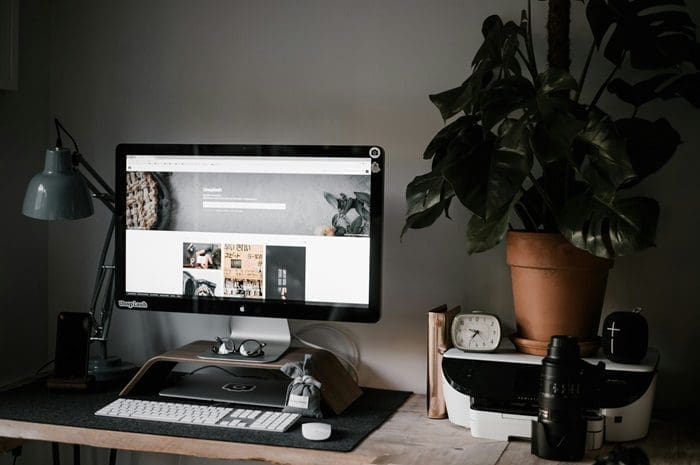 Monmouth County web designer working in a modern website design workspace.